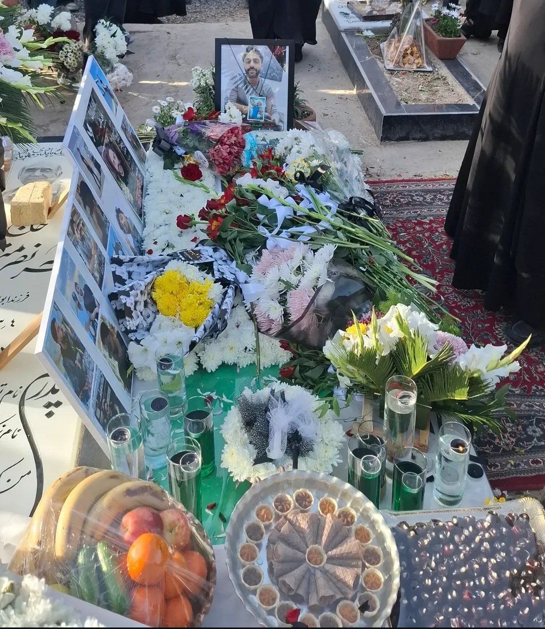 An image of slain protester Alireza Mousavi Noor’s grave