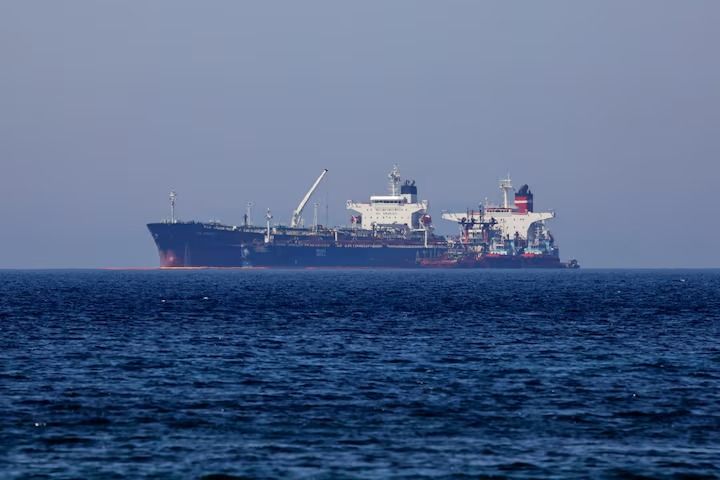 The Liberian-flagged oil tanker Ice Energy transfers crude oil from the Iranian-flagged oil tanker Lana (former Pegas), off the shore of Karystos, on the Island of Evia, Greece, May 26, 2022. 
