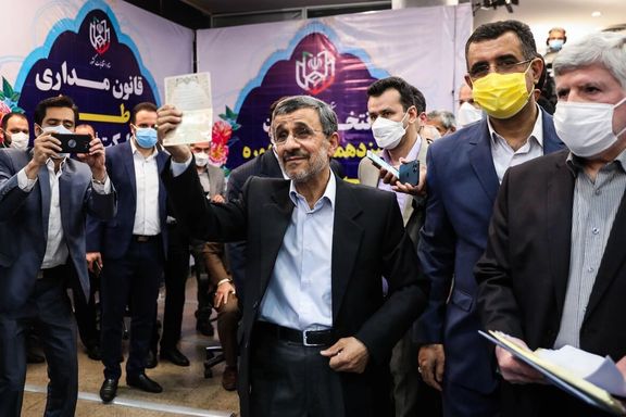 Mahmoud Ahmadinejad registering as a presidential candidate, but he was barred from running. May 2021