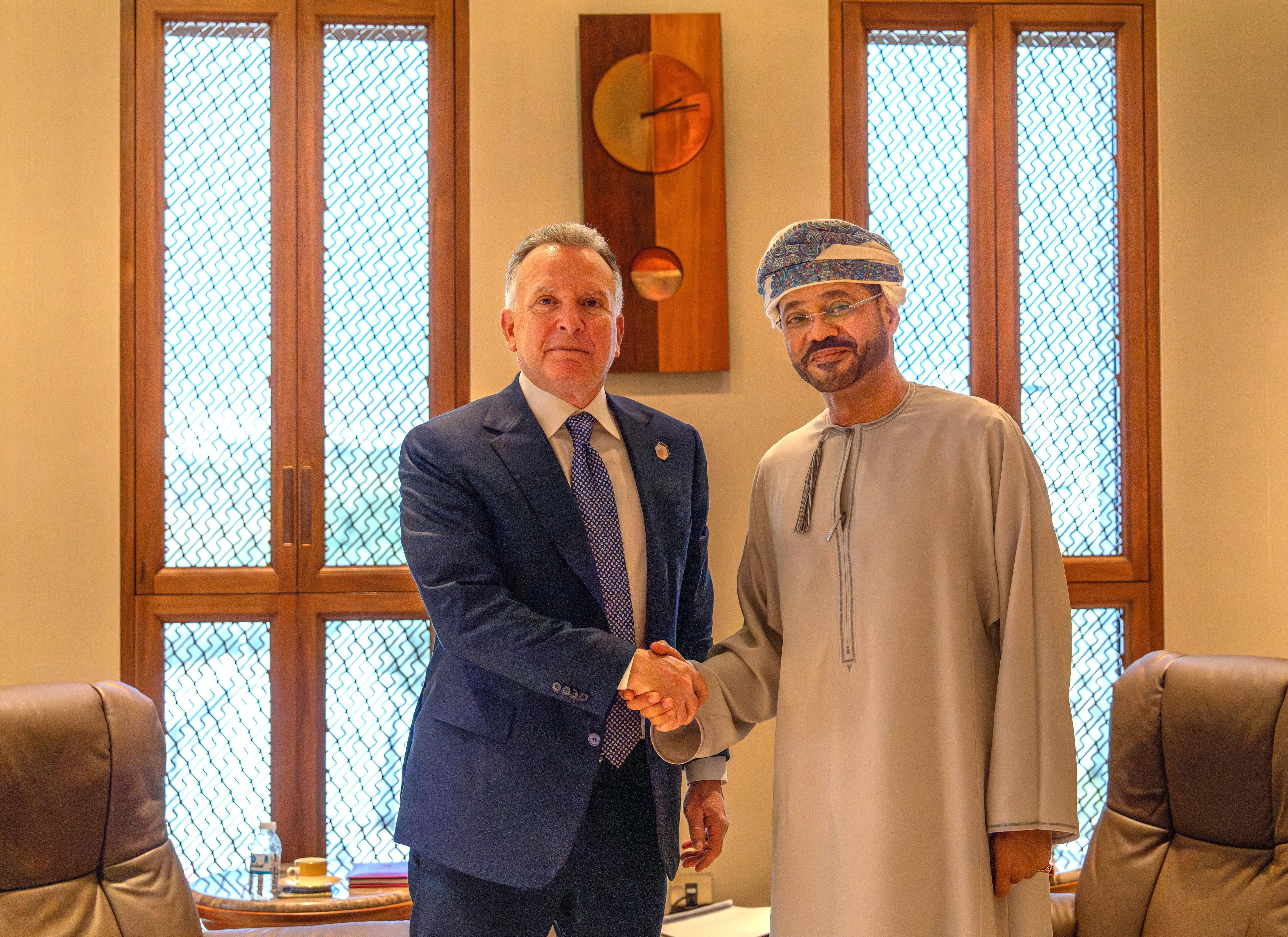 US Special Envoy to the Middle East Steve Witkoff shakes hands with Omani Foreign Minister Sayyid Badr Albusaidi in Muscat, Oman, April 12, 2025. 
