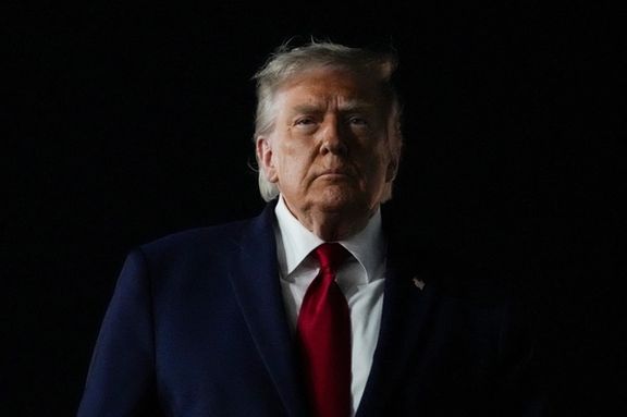 US President Donald Trump looks on, as he returns after attending Game 3 of the NBA Finals, at John F. Kennedy International Airport in New York on June 8, 2026.