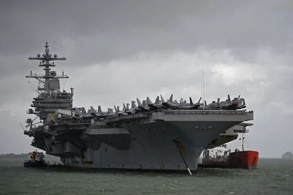 The USS George H.W. Bush aircraft carrier is seen anchored off Stokes Bay in the Solent, Britain, July 27, 2017.