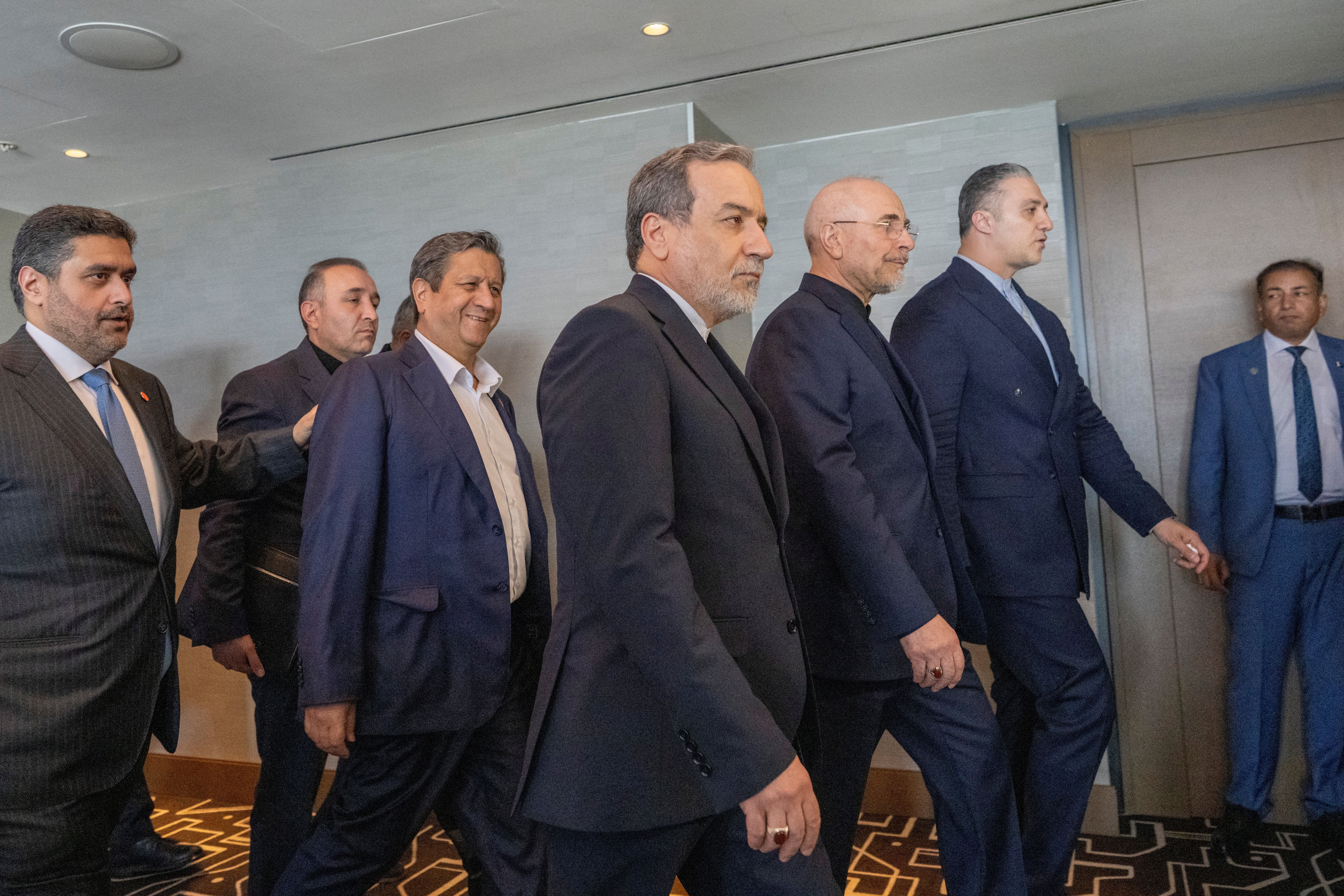 Minister of Foreign Affairs of Iran Abbas Araqchi, and Speaker of Iran Mohammed Bagher Ghalibaf with the delegation of Iran at the Lake Lucerne Summit at the Buergenstock resort in Obbuergen, near Lucerne, Switzerland, Sunday, June 21, 2026. 
