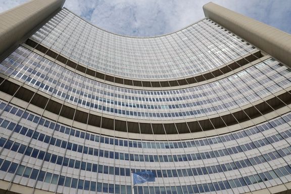 The flag of the International Atomic Energy Agency (IAEA) flutters in front of the agency's headquarters in Vienna, Austria, June 3, 2024.
