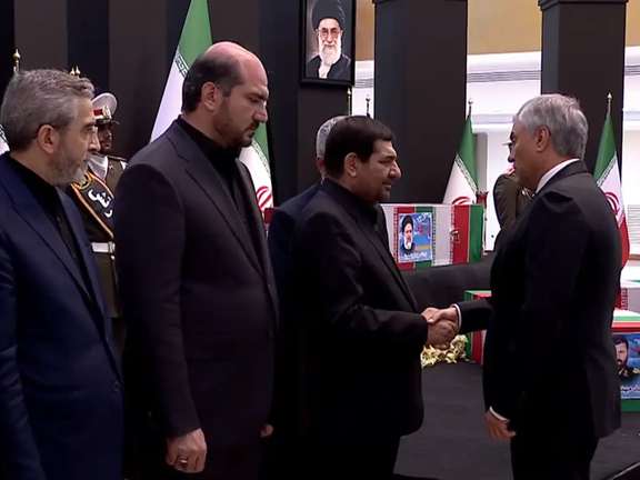 Acting President Mohammad Mokhber greeting the speaker of Russia's parliament Vyacheslav Volodin, May 22, 2024.