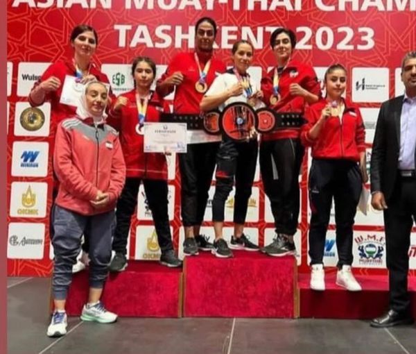 Iran's national women's muay thai team standing on podium without mandatory hijab at the Asian Championships held in Tashkent, Uzbekistan's capital (August 2023)