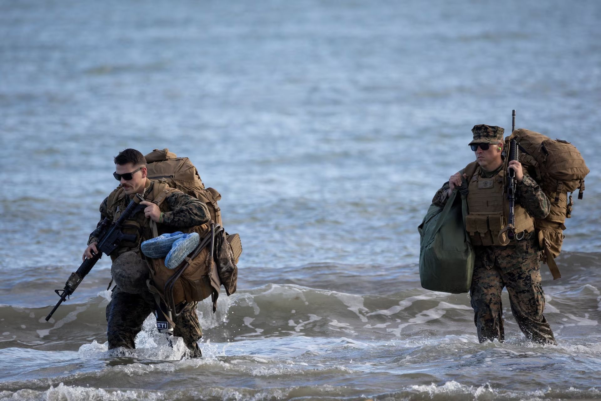 US Marines disembark from a U.S. Navy Landing Craft Utility (LCU) during amphibious operations in Arroyo, Puerto Rico, December 9, 2025