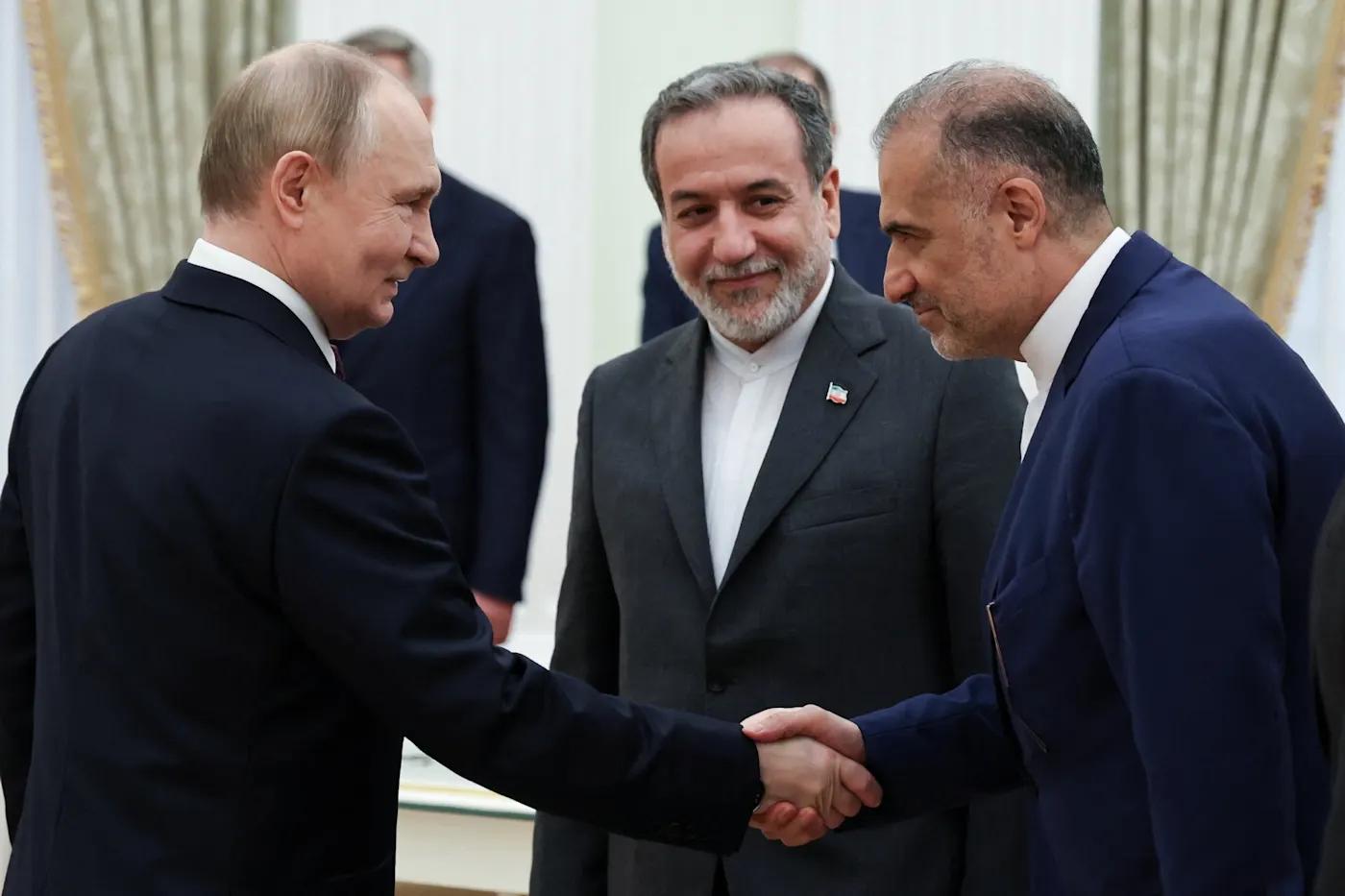 Russian President Vladimir Putin, Abbas Araghchi, Iran’s foreign minister, and Kazem Jalali, Tehran’s ambassador to Moscow