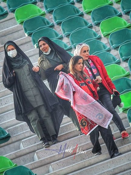 Hijab enforcers and female fans at Tehran's Azadi Stadium