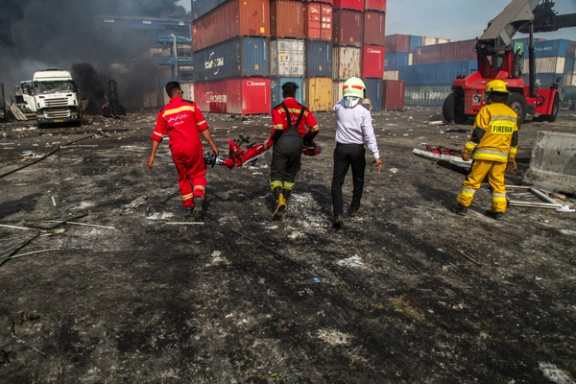 Firefighters respond to an explosion at Shahid Rajaee Port in Bandar Abbas, Iran.