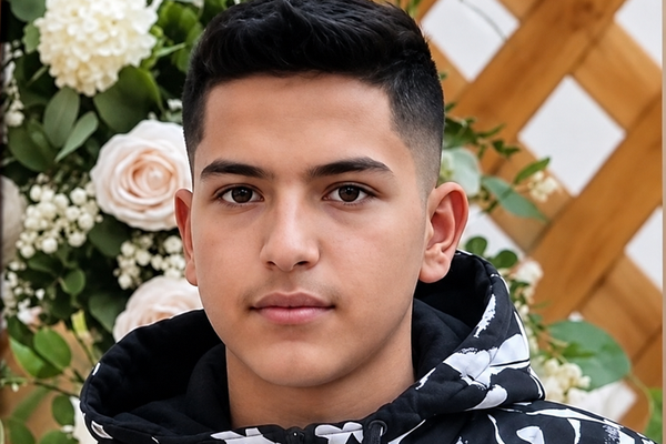 Teenage boy dies in custody after beating by Iran's Basij forces, source says