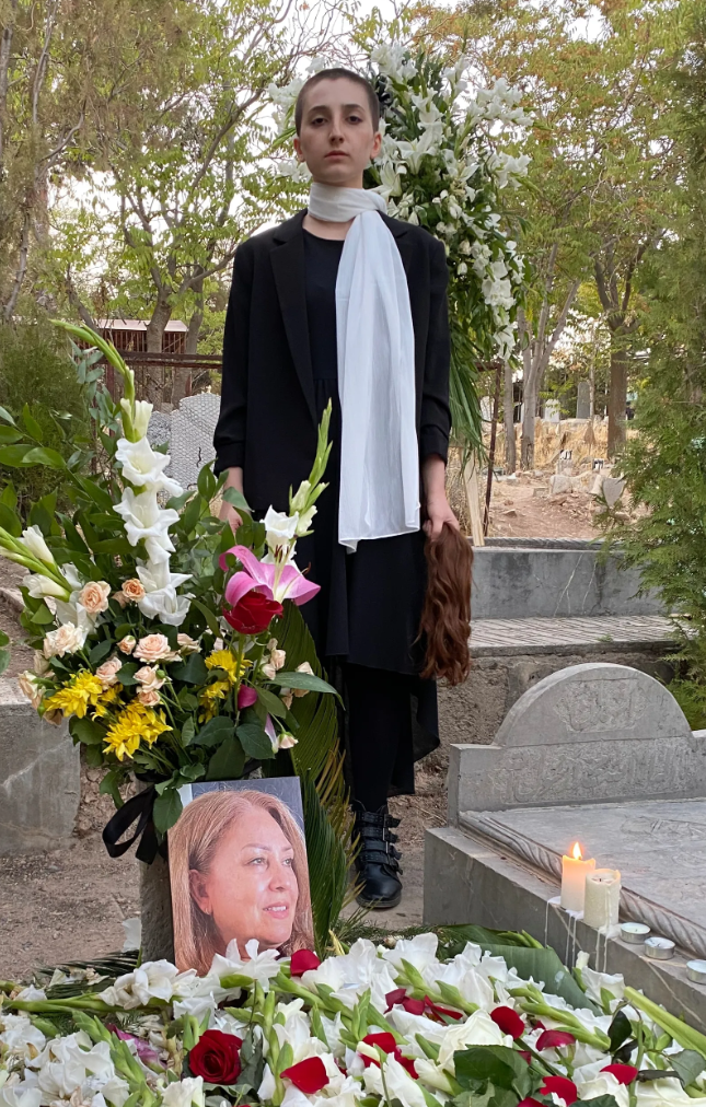Roya Piraei at her mother's grave. 