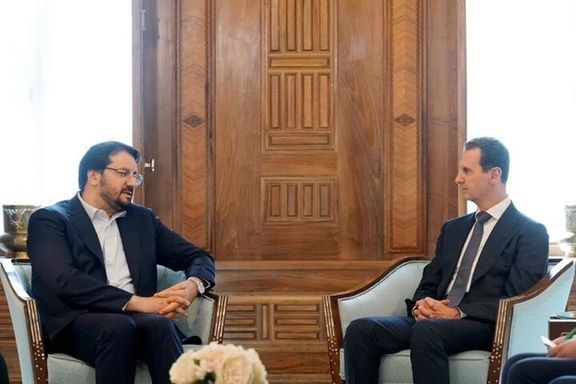 Iran’s Minister of Transport and Urban Development Mehrdad Bazrpash (left) during a meeting with Syrian President Bashar al-Assad in Damascus on April 27, 2023