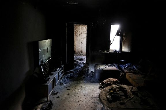 A view shows the living room of a burnt house, following a deadly infiltration by Hamas gunmen from the Gaza Strip, in Kibbutz Kfar Aza in southern Israel, October 15, 2023.