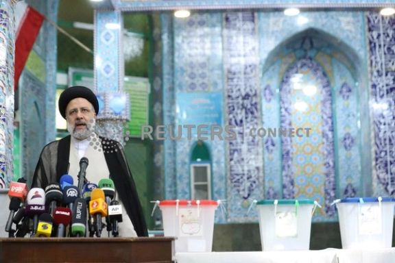 Ebrahim Raisi casting his ballot in June 2021