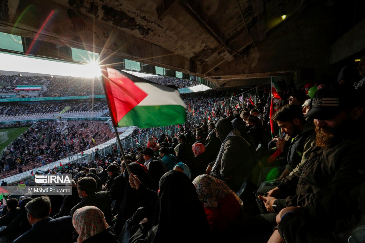 A Palestinian flag waving during a regime-sponsored religious gathering to commemorate the holy month of Ramadan at the Azadi Stadium in western Tehran, Iran, on March 26, 2024  