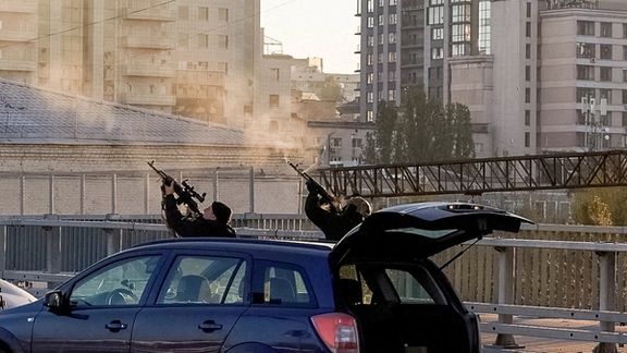 Ukrainian police firing at a reported Iranian drone over Kyiv on October 17, 2022