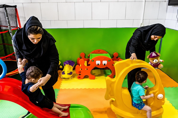 Rising daycare fees push Iranian families to rely on grandparents