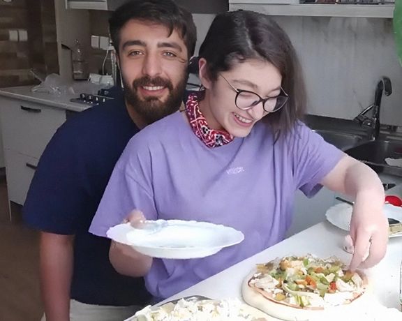 Sarina Esmailzadeh and her brother in one of her cooking posts