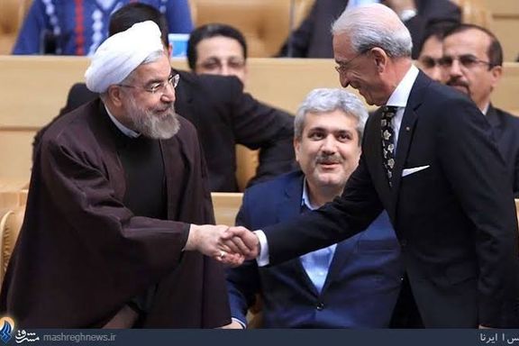 Dr.Madjid Samii (right) shaking hands with former president Hassan Rouhani in Tehran in 2014