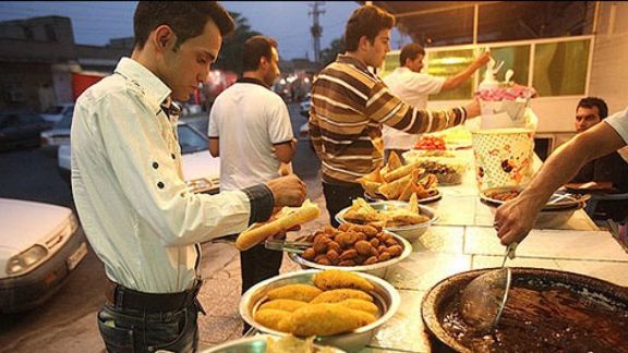 With rising price of bread, reports say people share falafel sandwitches in Iran.
