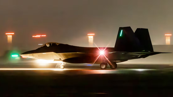 A US military F-22 Raptor lands at Lakenheath Air Base in England on Feb. 19, 2026.