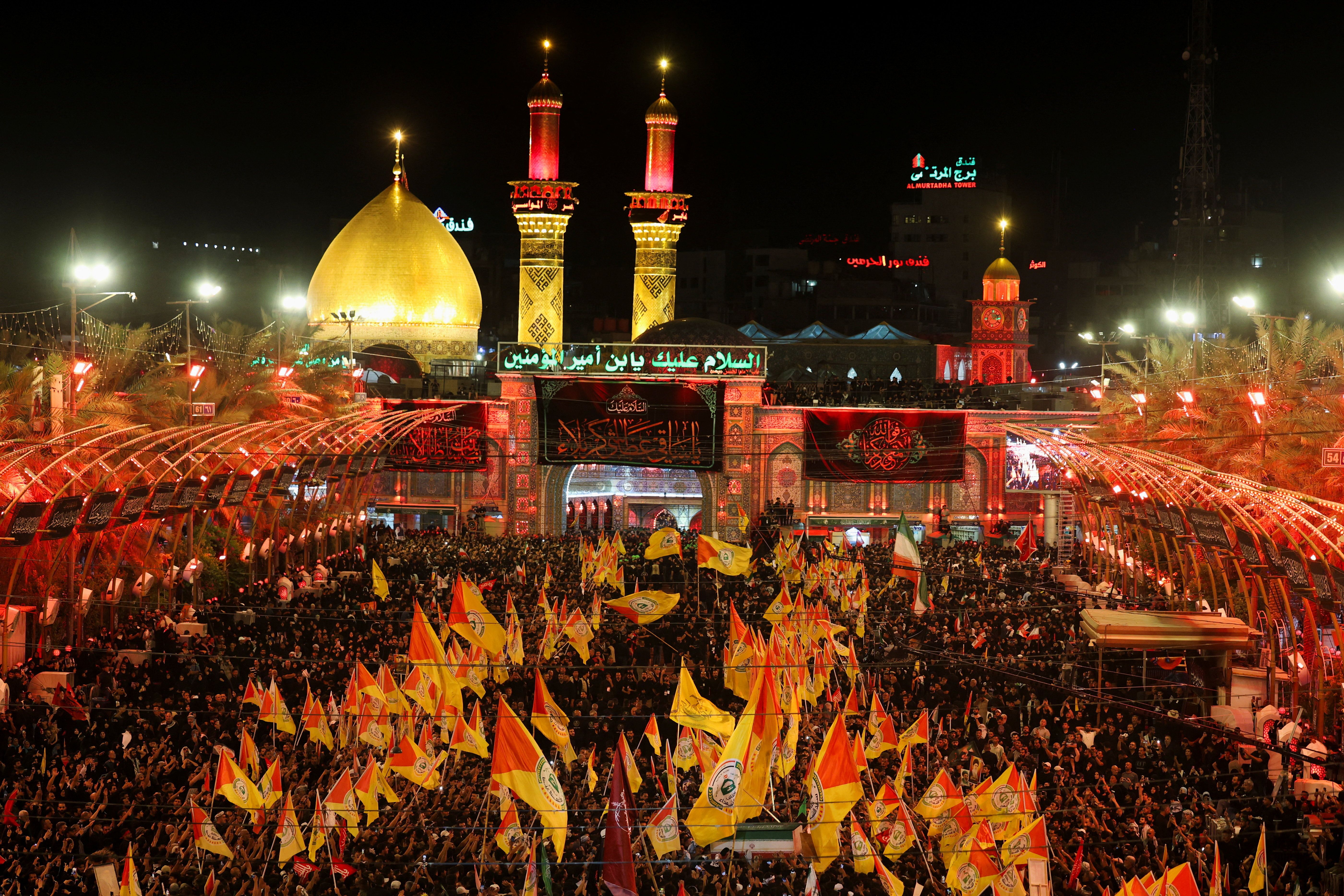 People attend a funeral procession for Iran's slain Supreme Leader Ali Khamenei during a funeral procession in Karbala, Iraq, July 9, 2026. 