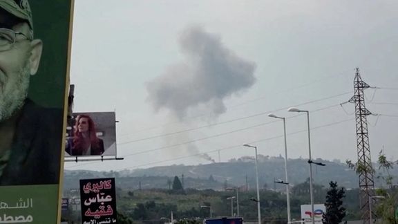 Smoke rises from a site believed to have been hit by an Israeli strike, in southern Lebanon, in this screen grab taken from a video, February 27, 2024.