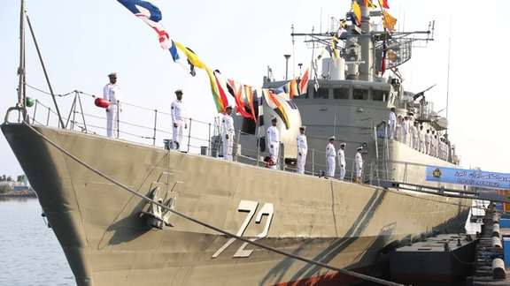 The Alborz frigate at port.