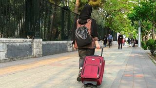 Iran courts expatriates after war but faces deep distrust