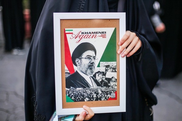 Talks or resistance? Iran's factions differ over path out of crisis