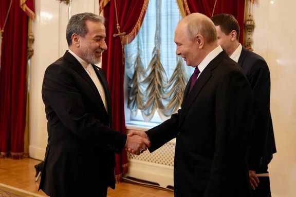 Russia's president Vladimir Putin greets Iran's foreign minister Abbas Araghchi in St Petersburg, April 27, 2026