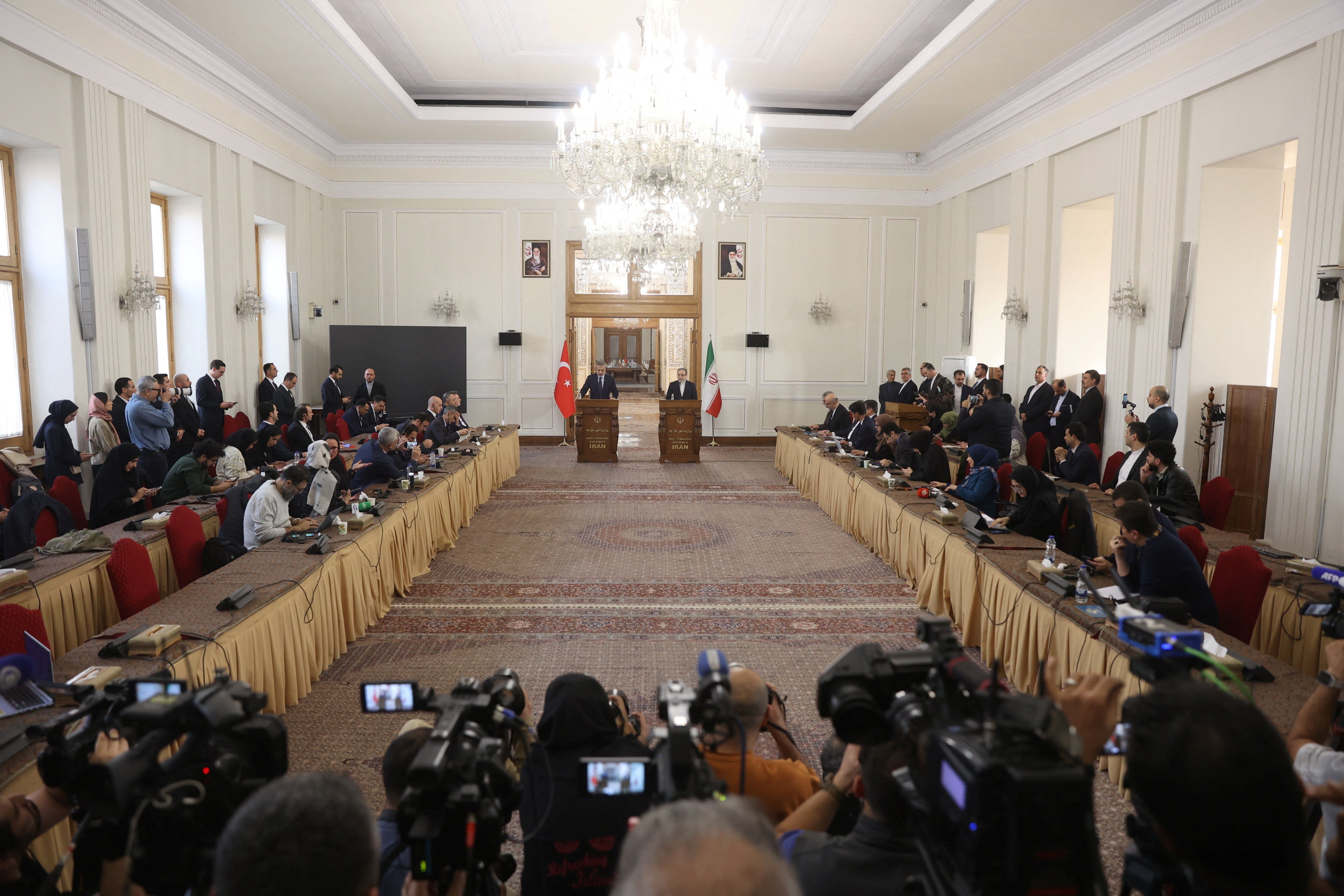 Iranian Foreign Minister Abbas Araghchi and Turkish Foreign Minister Hakan Fidan attend a joint press conference in Tehran, Iran, November 30, 2025.