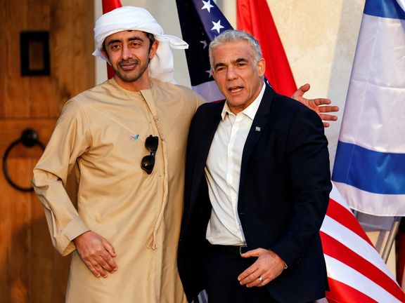 Israel's Foreign Minister Yair Lapid greets his UAE counterpart Sheikh Abdullah bin Zayed Al Nahyan on Sunday.