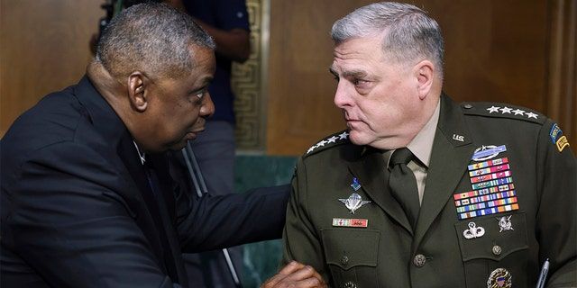 Defense Secretary Lloyd Austin (left) and Chairman of the Joint Chiefs Gen Mark Milley (undated)