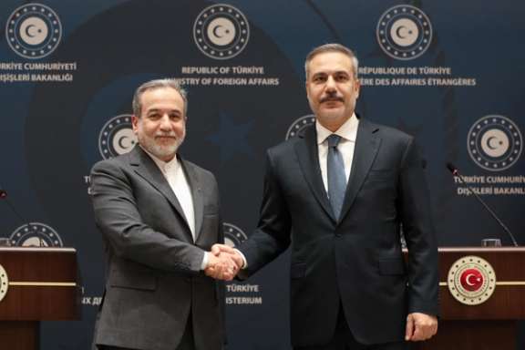 Turkish Foreign Minister Hakan Fidan shakes hands with his Iranian counterpart Abbas Araqchi during a press conference in Istanbul, Turkey, on January 30, 2026.