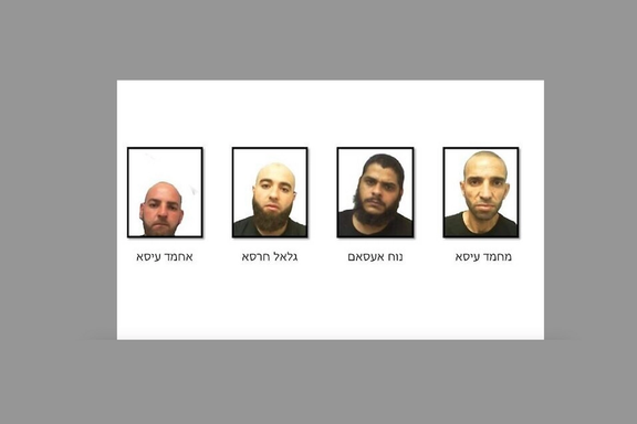 This handout image released August 24, 2023, shows four suspects arrested for ties to Hezbollah and smuggling weapons into Israel