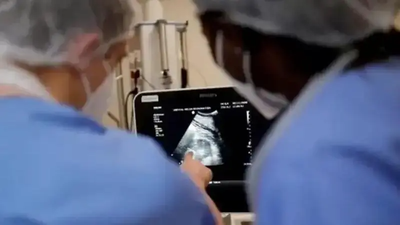 Medical professionals in Iran examine an ultrasound image (Undated)