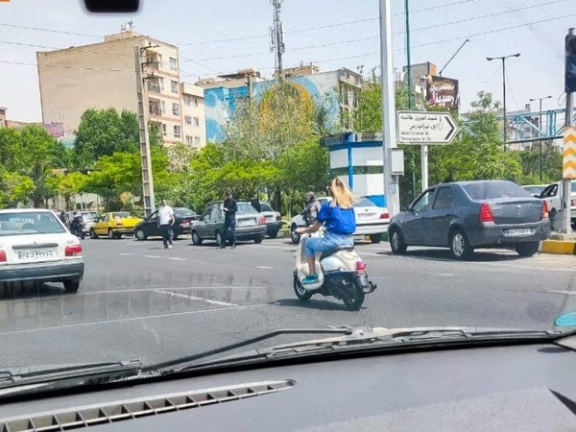An Iranian woman riding a motorcycle in Tehran