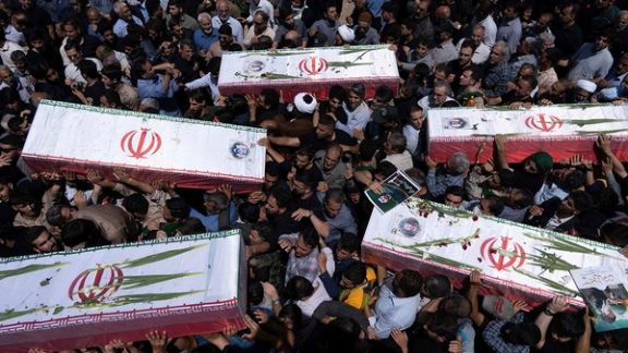 Israel attacks Iran state media, orders evacuations and moots regime change