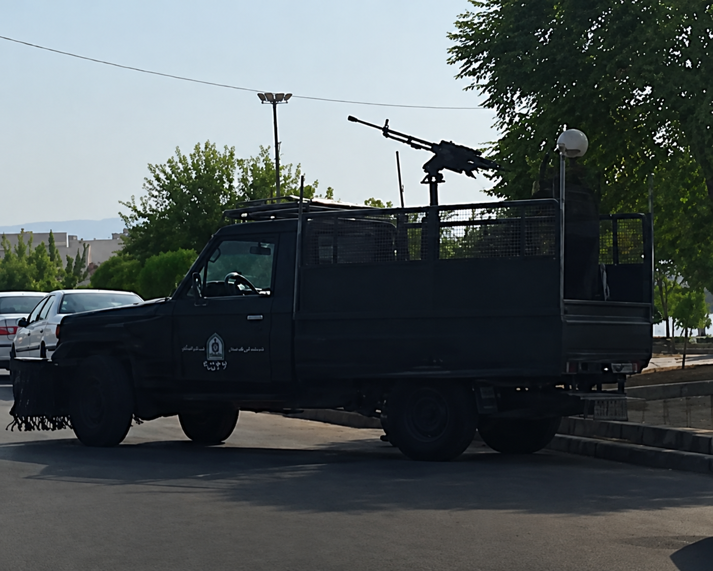 Iran deploys security forces as gasoline price rise takes effect