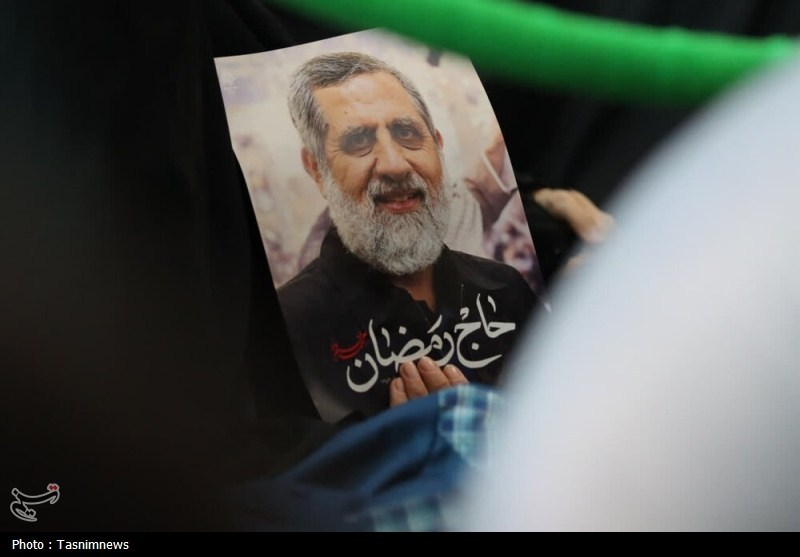 A photo of Hajj Ramazan, an IRGC Quds Force commander in charge of Iran's operations in Palestine killed by Israel, displayed at the ceremony