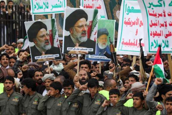 Houthi supporters hold up posters of late Iranian President Ebrahim Raisi as they rally to show solidarity with Palestinians in Gaza, in Sanaa, Yemen May 24, 2024.