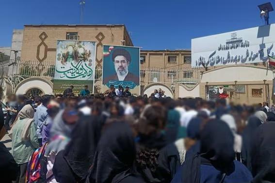 Students in Kermanshah, western Iran, gather outside the Kermanshah provincial directorate of education.