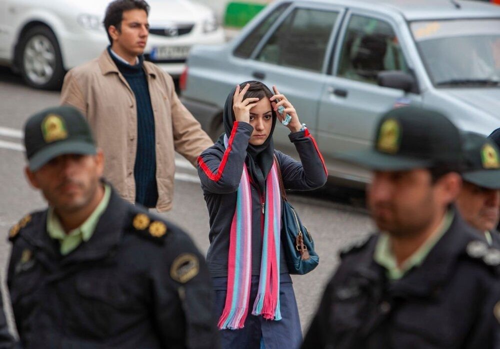 A young woman on a street in Iran 