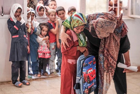 Iranian schoolchildren with a female teacher