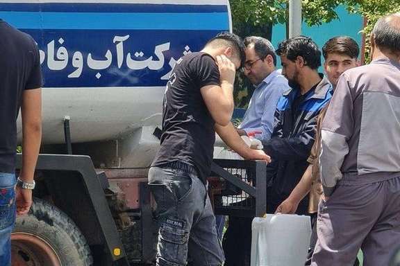 Tankers belonging to Tehran Water and Sewage Company distributing drinking water among people