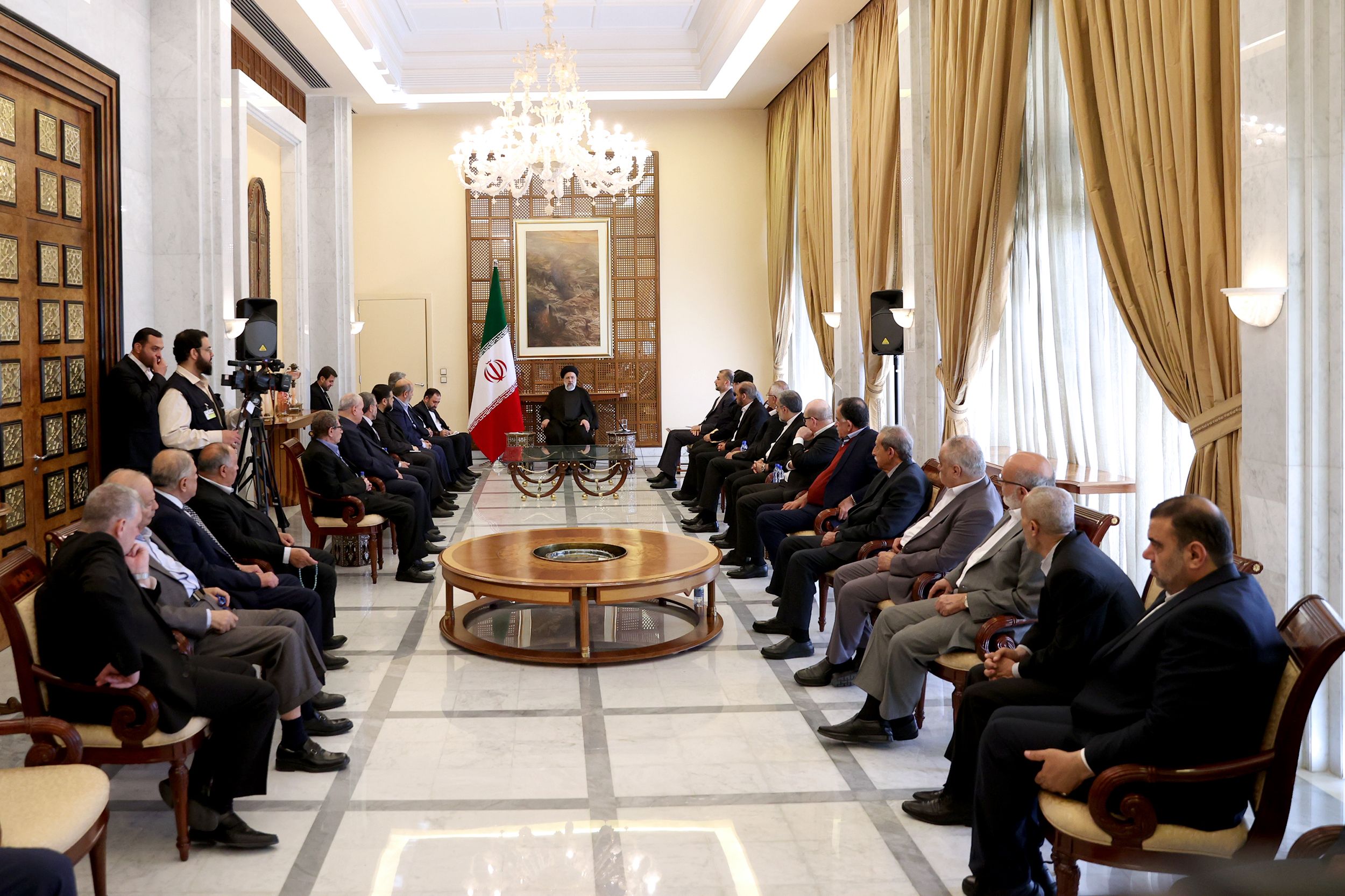 Iranian President Ebrahim Raisi during a meeting with representatives of militia groups in Syria on May 4, 2023 