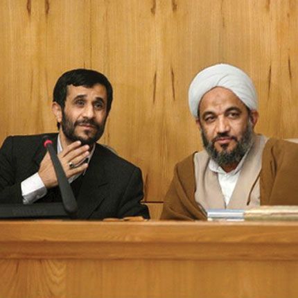 Former president Mahmoud Ahmadinejad (left) and Morteza Aghatehrani  (undated)