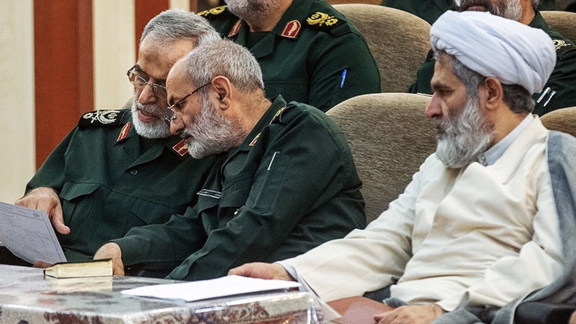 Hossein Ta'eb (R) with IRGC generals at an event. (Undated)